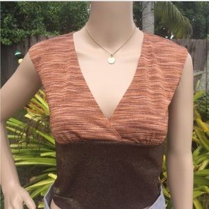 Bamboo and brown with a light shimmer. 16 inches long 32 bust